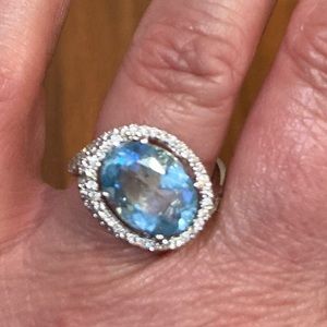 Aqua marine beautiful ring!!wore only  twice . Got ring from an ex he paid 5800